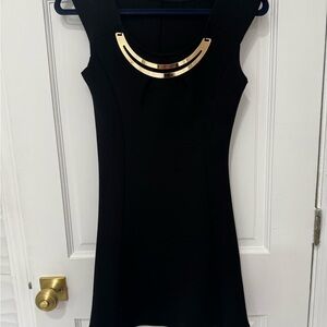 Elegant Black Dress with Gold Accent